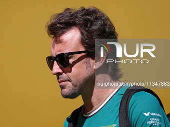 Fernando Alonso, from Aston Martin Aramco Formula One Team, is arriving at the Barcelona Catalunya circuit, in Barcelona, Spain, on June 21,...