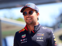 Sergio Perez, from Oracle Red Bull Racing team, is arriving at the Barcelona Catalunya circuit, in Barcelona, Spain, on June 21, 2024. (