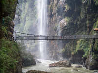 Tourists are viewing a waterfall at the Maling River Canyon scenic spot in Xingyi, China, on June 21, 2024. (