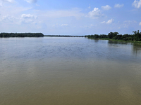 The river water of Teesta is flowing with an increased water level due to heavy rainfall in Jalpaiguri, Sikkim, on June 21, 2024, some 75 km...