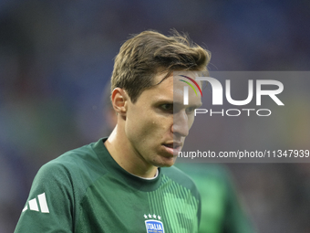 Riccardo Calafiori centre-back of Italy and Bologna FC 1909 during the warm-up before the UEFA EURO 2024 group stage match between Spain and...