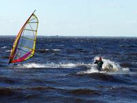 People are practicing kiteboarding and windsurfing on the Kremenchuk Reservoir in Cherkasy, Ukraine, on June 20, 2024. NO USE RUSSIA. NO USE...