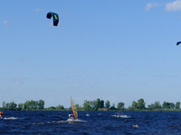 People are practicing kiteboarding and windsurfing on the Kremenchuk Reservoir in Cherkasy, Ukraine, on June 20, 2024. NO USE RUSSIA. NO USE...