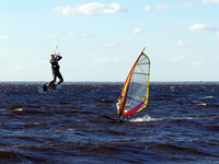 People are practicing kiteboarding and windsurfing on the Kremenchuk Reservoir in Cherkasy, Ukraine, on June 20, 2024. NO USE RUSSIA. NO USE...