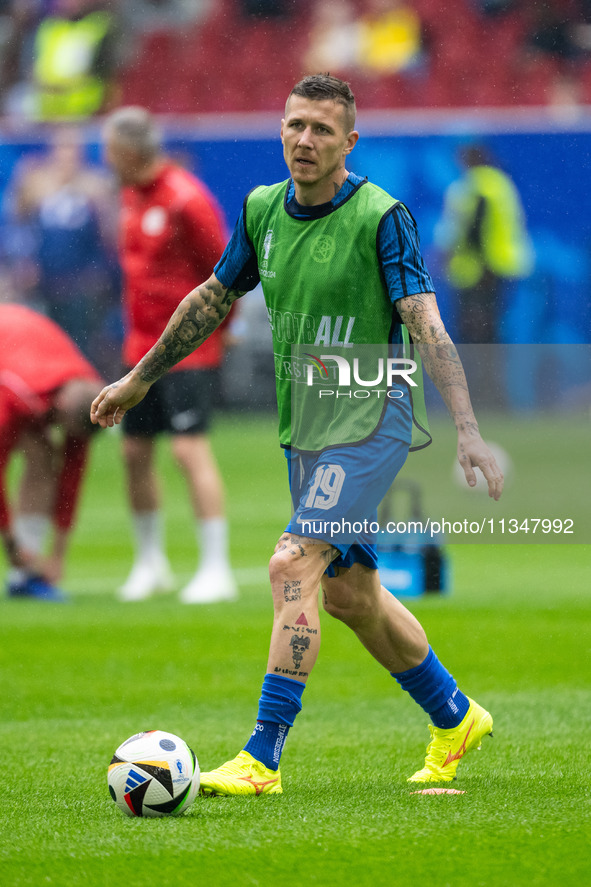 Juraj Kucka of Slovakia is warming up  during the UEFA EURO 2024 group stage match between Slovakia and Ukraine at Düsseldorf Arena on June...