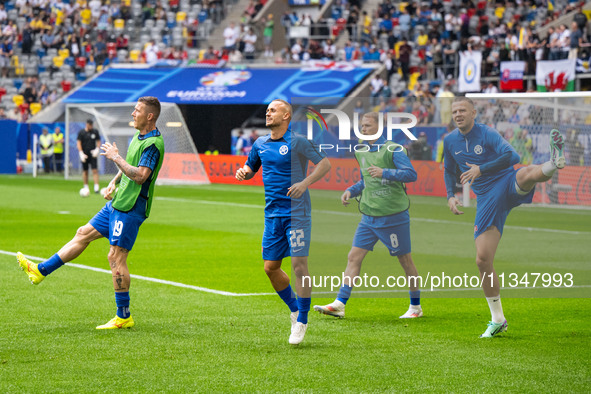 Players of Slovakia are warming up  during the UEFA EURO 2024 group stage match between Slovakia and Ukraine at Düsseldorf Arena on June 21,...