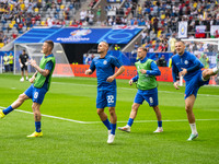 Players of Slovakia are warming up  during the UEFA EURO 2024 group stage match between Slovakia and Ukraine at Düsseldorf Arena on June 21,...