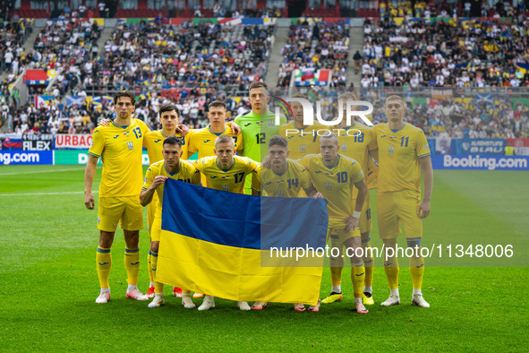 The players of Ukraine are posing for a team photo  during the UEFA EURO 2024 group stage match between Slovakia and Ukraine at Düsseldorf A...