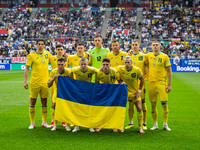 The players of Ukraine are posing for a team photo  during the UEFA EURO 2024 group stage match between Slovakia and Ukraine at Düsseldorf A...