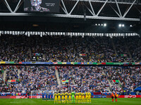 Players of Slovakia and Ukraine are taking part in a minute of silence  during the UEFA EURO 2024 group stage match between Slovakia and Ukr...