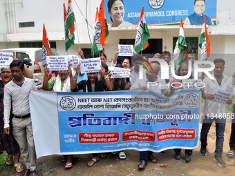 Members of Trinamool Congress are staging a protest rally against education minister Dharmendra Pradhan on the issue of alleged NEET Medical...