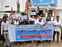 Members of Trinamool Congress are staging a protest rally against education minister Dharmendra Pradhan on the issue of alleged NEET Medical...