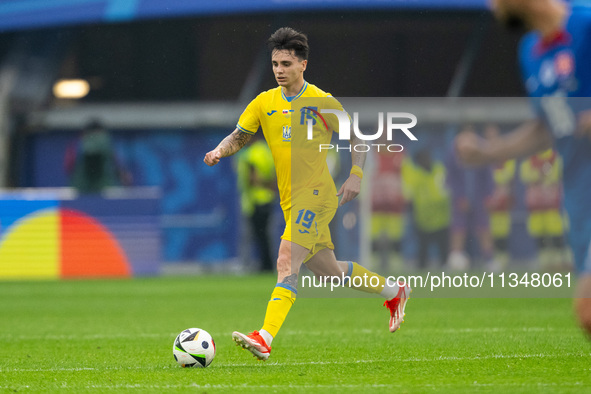 Mykola Shaparenko of Ukraine is controlling the ball  during the UEFA EURO 2024 group stage match between Slovakia and Ukraine at Düsseldorf...