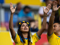 A fan of Ukraine is preparing for the match  during the UEFA EURO 2024 group stage match between Slovakia and Ukraine at Düsseldorf Arena on...