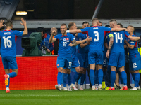 Ivan Schranz of Slovakia is celebrating with his teammates after scoring his team's first goal  during the UEFA EURO 2024 group stage match...