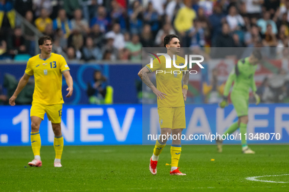 Mykola Shaparenko is looking dejected after Slovakia's first goal  during the UEFA EURO 2024 group stage match between Slovakia and Ukraine...