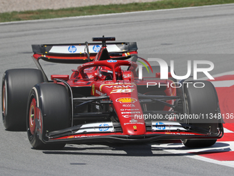 Charles Leclerc is driving a Ferrari SF24 for Scuderia Ferrari HP during practice 1 of the Formula 1 Aramco Spanish Grand Prix, held at the...