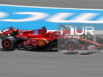 Charles Leclerc is driving a Ferrari SF24 for Scuderia Ferrari HP during practice 1 of the Formula 1 Aramco Spanish Grand Prix, held at the...