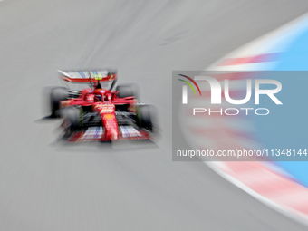 Carlos Sainz, from Scuderia Ferrari HP, is driving a Ferrari SF24 during practice 1 of the Formula 1 Aramco Spanish Grand Prix, held at the...