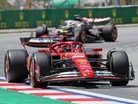 Carlos Sainz, from Scuderia Ferrari HP, is driving a Ferrari SF24 during practice 1 of the Formula 1 Aramco Spanish Grand Prix, held at the...