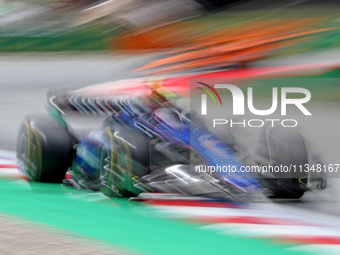 Logan Sargeant is driving a Williams FW46 from Williams Racing during practice 1 of the Formula 1 Aramco Spanish Grand Prix, held at the Bar...