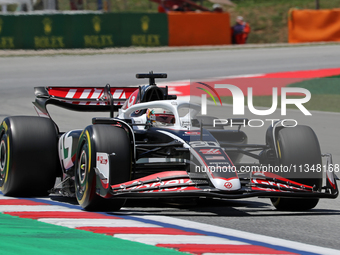 Kevin Magnussen is driving a Haas VF-24 during practice 1 of the Formula 1 Aramco Spanish Grand Prix, held at the Barcelona Catalunya circui...