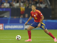 Rodrigo Hernandez defensive midfield of Spain and Manchester City during the UEFA EURO 2024 group stage match between Spain and Italy at Are...