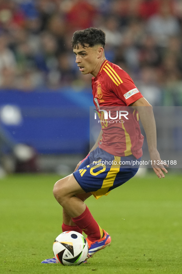 Pedri central midfield of Spain and FC Barcelona during the UEFA EURO 2024 group stage match between Spain and Italy at Arena AufSchalke on...