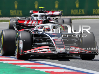 Kevin Magnussen is driving a Haas VF-24 during practice 1 of the Formula 1 Aramco Spanish Grand Prix, held at the Barcelona Catalunya circui...