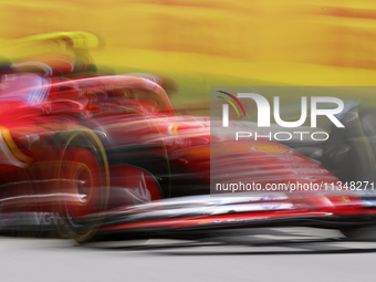 Carlos Sainz is driving a Ferrari SF24 during practice 1 of the Formula 1 Aramco Spanish Grand Prix, held at the Barcelona Catalunya circuit...