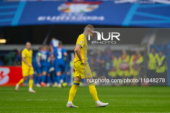 Artem Dovbyk of Ukraine is looking on after Slovakia's first goal  during the UEFA EURO 2024 group stage match between Slovakia and Ukraine...