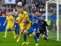 Ruslan Malinovskyi of Ukraine is battling for possession with Juraj Kucka of Slovakia (L-R)  during the UEFA EURO 2024 group stage match bet...