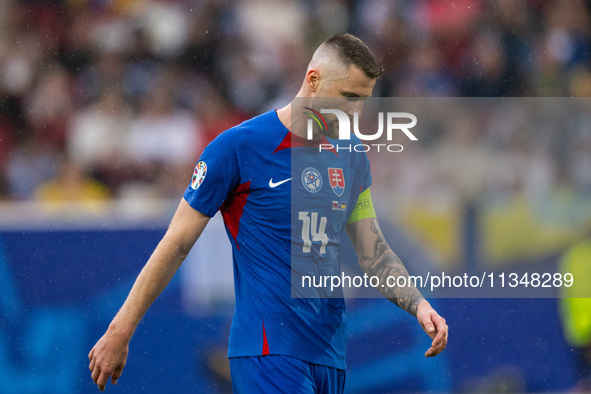 Milan Skriniar of Slovakia is looking on  during the UEFA EURO 2024 group stage match between Slovakia and Ukraine at Dusseldorf Arena on Ju...