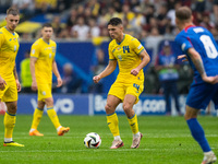 Georgiy Sudakov of Ukraine is controlling the ball  during the UEFA EURO 2024 group stage match between Slovakia and Ukraine at Dusseldorf A...