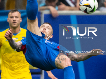 Juraj Kucka of Slovakia is shooting  during the UEFA EURO 2024 group stage match between Slovakia and Ukraine at Dusseldorf Arena on June 21...