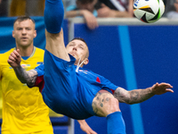 Juraj Kucka of Slovakia is shooting  during the UEFA EURO 2024 group stage match between Slovakia and Ukraine at Dusseldorf Arena on June 21...