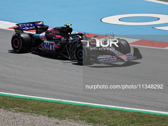 Pierre Gasly is participating in free practice for the Catalunya Grand Prix F1 at the Circuit of Catalunya in Barcelona, Spain, on June 21,...