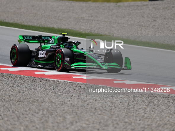 Guanyu Zhou is participating in free practice for the Catalunya Grand Prix F1 at the Circuit of Catalunya in Barcelona, Spain, on June 21, 2...