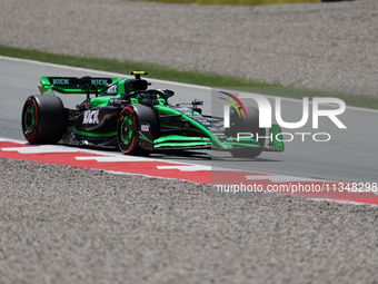 Guanyu Zhou is participating in free practice for the Catalunya Grand Prix F1 at the Circuit of Catalunya in Barcelona, Spain, on June 21, 2...