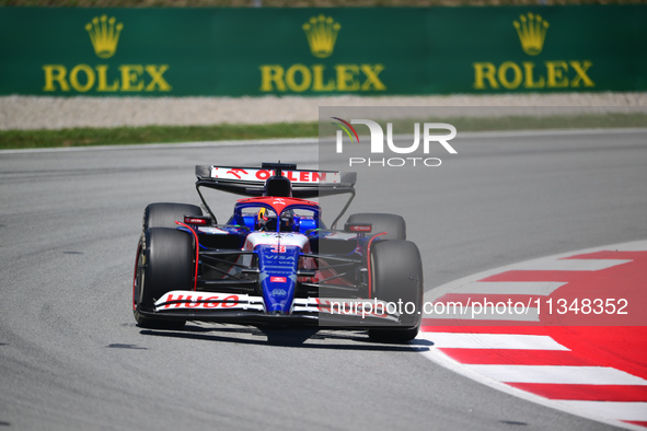 Daniel Ricciardo of Visa Cash-Up Racing Bulls is driving his single-seater during free practice of the Spanish GP, the 10th round of the For...