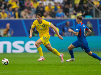 Ilya Zabarnyi of Ukraine is shooting  during the UEFA EURO 2024 group stage match between Slovakia and Ukraine at Dusseldorf Arena on June 2...