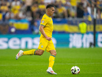 Oleksandr Tymchyk of Ukraine is controlling the ball  during the UEFA EURO 2024 group stage match between Slovakia and Ukraine at Dusseldorf...