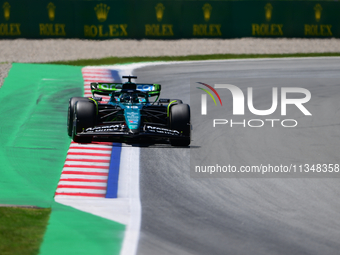 Fernando Alonso of Aston Martin Cognizant F1 Team is driving his single-seater during free practice of the Spanish GP, the 10th round of the...