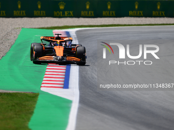 Oscar Piastri of McLaren F1 Team is driving his single-seater during free practice of the Spanish GP, the 10th round of the Formula 1 World...