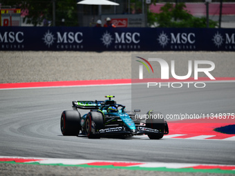 Fernando Alonso of Aston Martin Cognizant F1 Team is driving his single-seater during free practice of the Spanish GP, the 10th round of the...