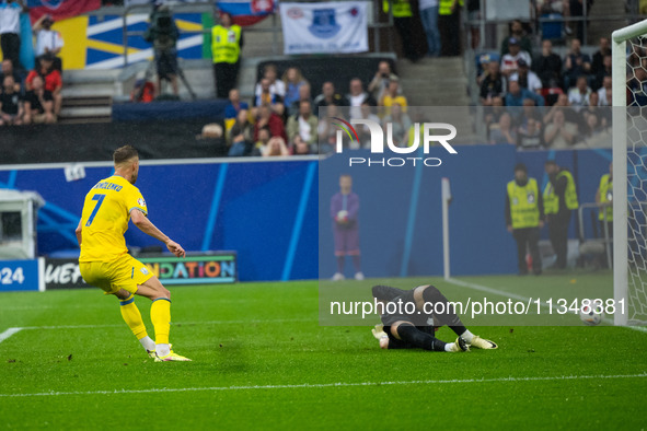 Andriy Yarmolenko of Ukraine is playing against Martin Dubravka of Slovakia  during the UEFA EURO 2024 group stage match between Slovakia an...