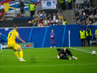 Andriy Yarmolenko of Ukraine is playing against Martin Dubravka of Slovakia  during the UEFA EURO 2024 group stage match between Slovakia an...