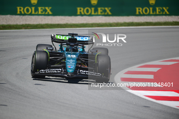 Lance Stroll of Aston Martin Cognizant F1 Team is driving his single-seater during free practice of the Spanish GP, the 10th round of the Fo...