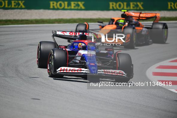 Daniel Ricciardo of Visa Cash-Up Racing Bulls is driving his single-seater during free practice of the Spanish GP, the 10th round of the For...