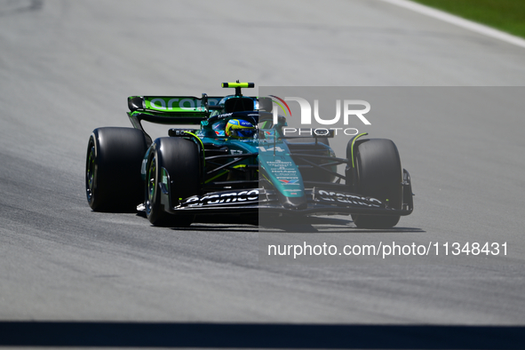 Fernando Alonso of Aston Martin Cognizant F1 Team is driving his single-seater during free practice of the Spanish GP, the 10th round of the...